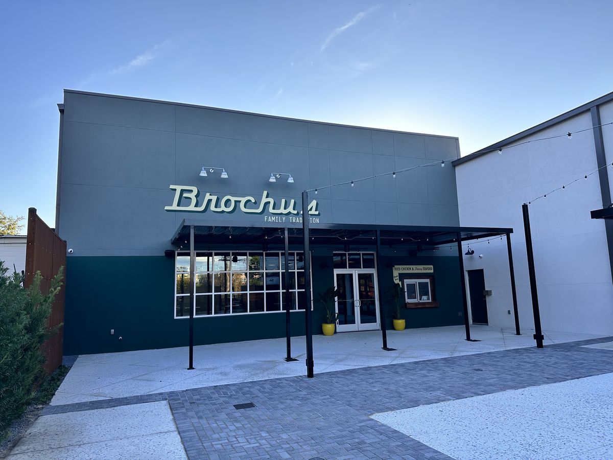 A blue building with a sign that reads Brochu’s.
