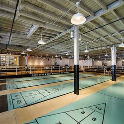 <a href="http://ny.eater.com/archives/2014/02/royal_palms_shuffleboard_club_opens.php">Royal Palms, New York's Very First Shuffleboard Club</a>