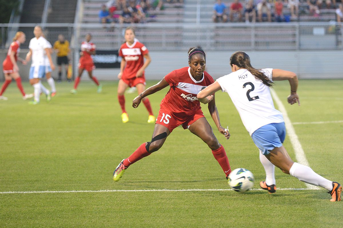 Robyn Gayle defends against Chicago Red Stars forward Jen Hoy in a 2013 NWSL match