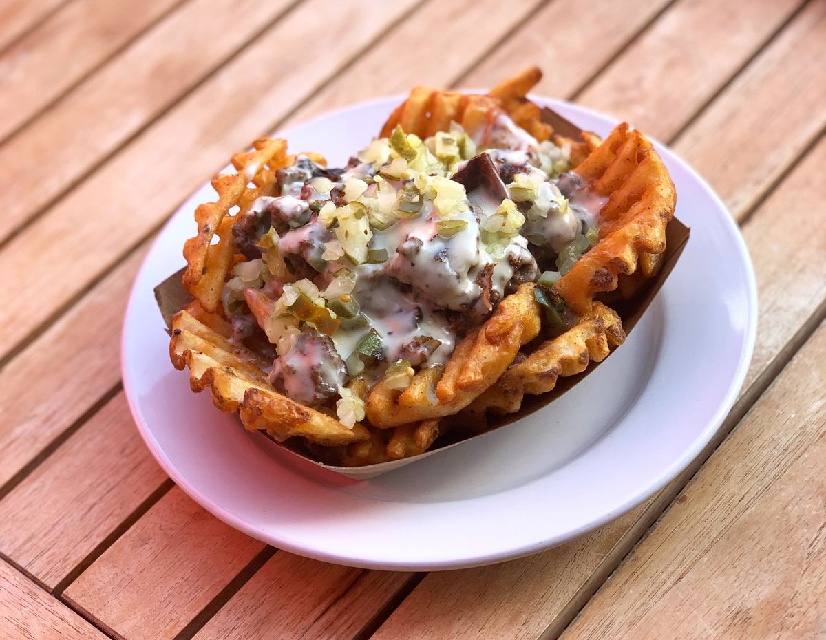 waffle fries with chopped meat and cheese