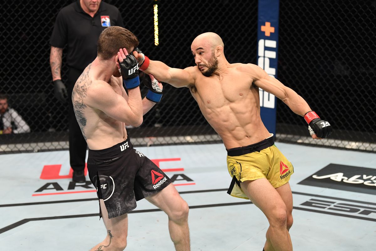 Marlon Moraes of Brazil lands a spinning backfist against Cory Sandhagen in their bantamweight bout during the UFC Fight Night event inside Flash Forum on UFC Fight Island on October 11, 2020 in Abu Dhabi, United Arab Emirates.