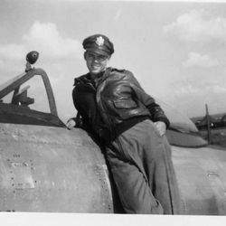 Second Lt. Gerald Kelly is shown with his plane somewhere in Europe.