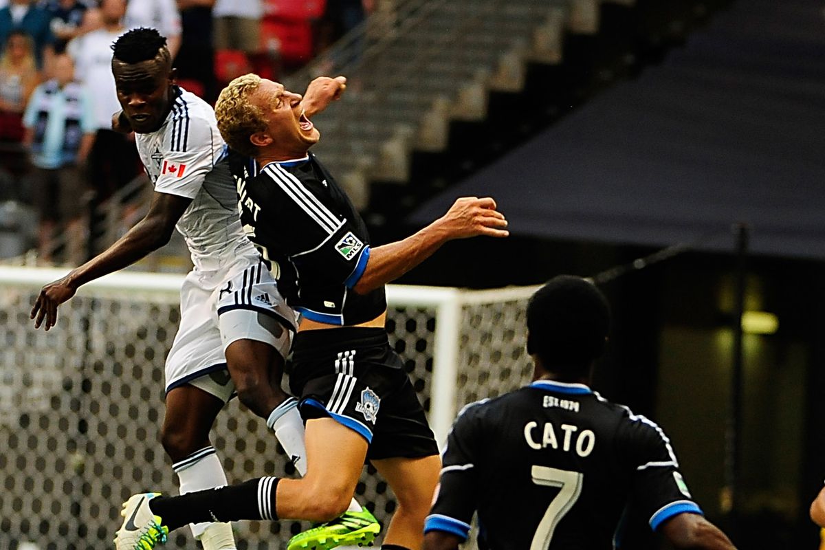 Gershon Koffie (far left) and Steven Lenhart (middle) at BC Place on August 10, 2013.  The Whitecaps defeated the Earthquakes 2-0.