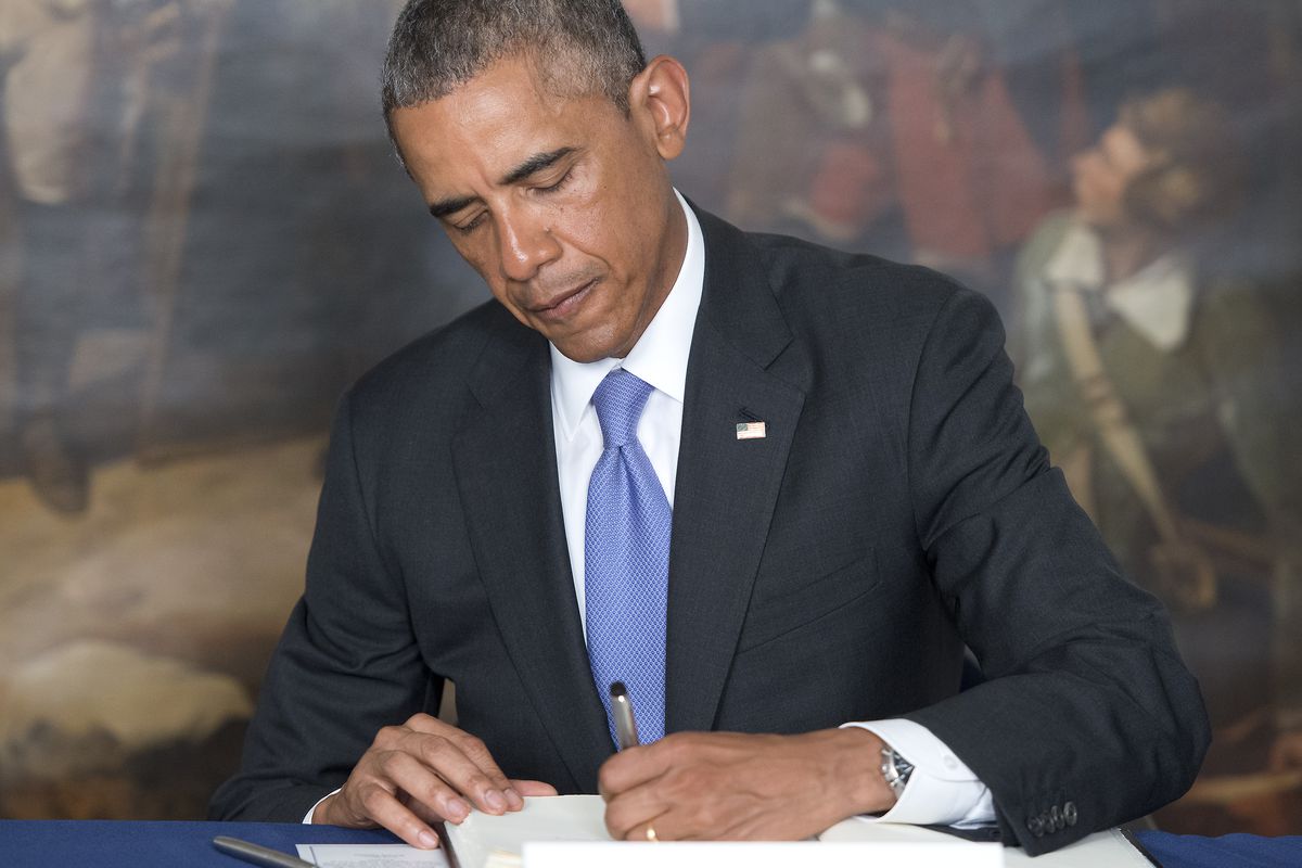 Obama Signs Condolence Book at the Embassy of France