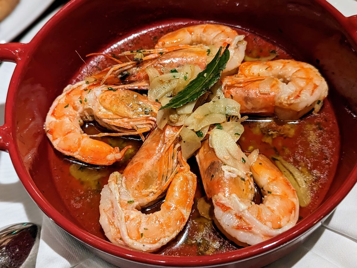 A Spanish-style preparation of shrimp with garlic in olive oil.