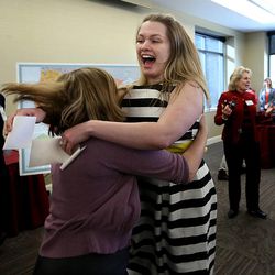 University of Utah medical student Amalia Winters screams as she celebrates with Jessica Mayer after opening their letters to find out where they are headed for residency during Match Day at the University of Utah in Salt Lake City on Friday, March 20, 2015. Winters will train in the thoracic surgery program at Emory University and Mayer will be at the U. in the pediatric medicine program.