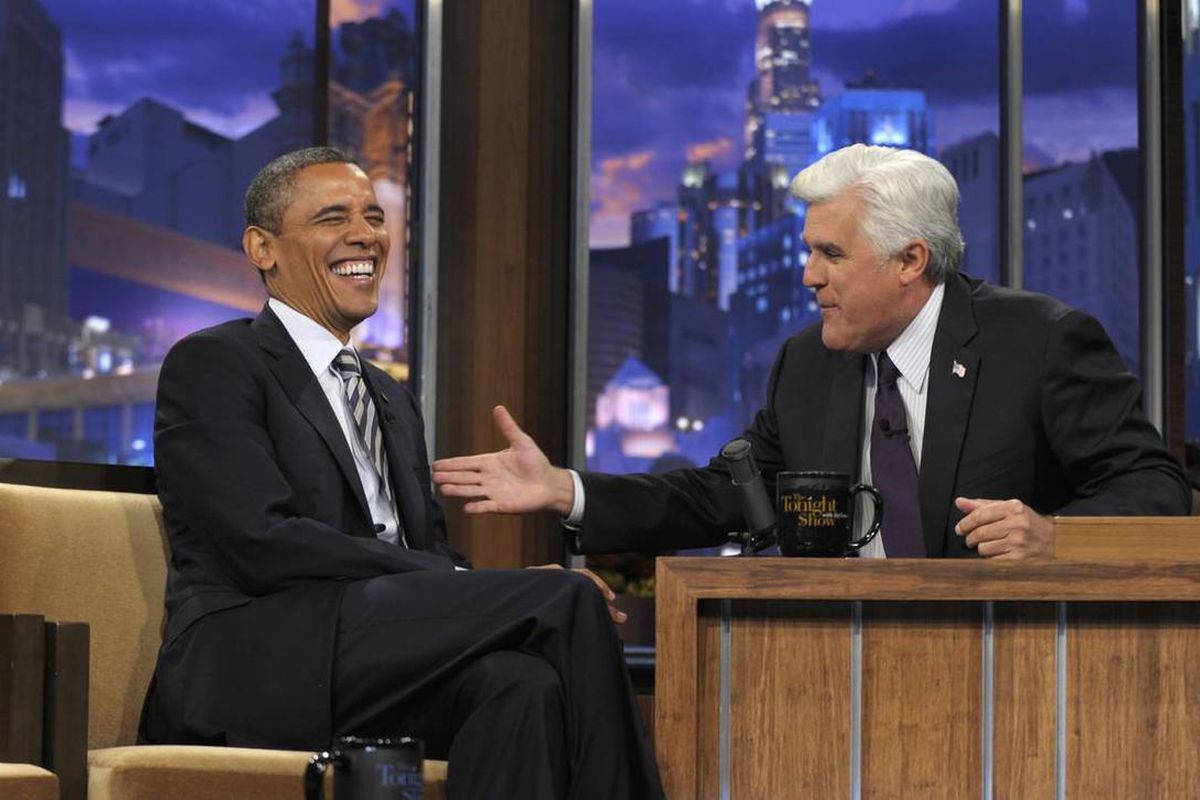 President Barack Obama talks in between segments of an interview at "The Tonight Show" with Jay Leno on Oct. 25, 2011.