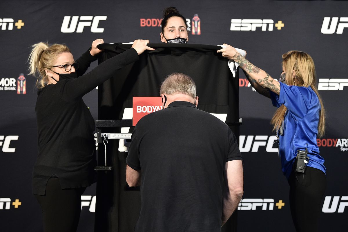 Jessica Eye attempts to make weight for her bout during the UFC Fight Night weigh-in at UFC APEX on June 12, 2020 in Las Vegas, Nevada.