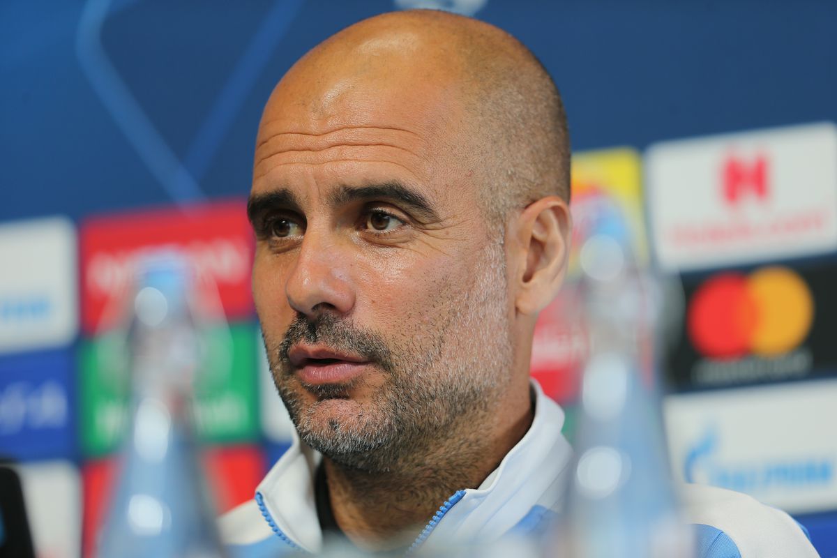 Manchester City’s manager Pep Guardiola speaks during a press conference at Manchester City Football Academy on August 06, 2020 in Manchester, England.