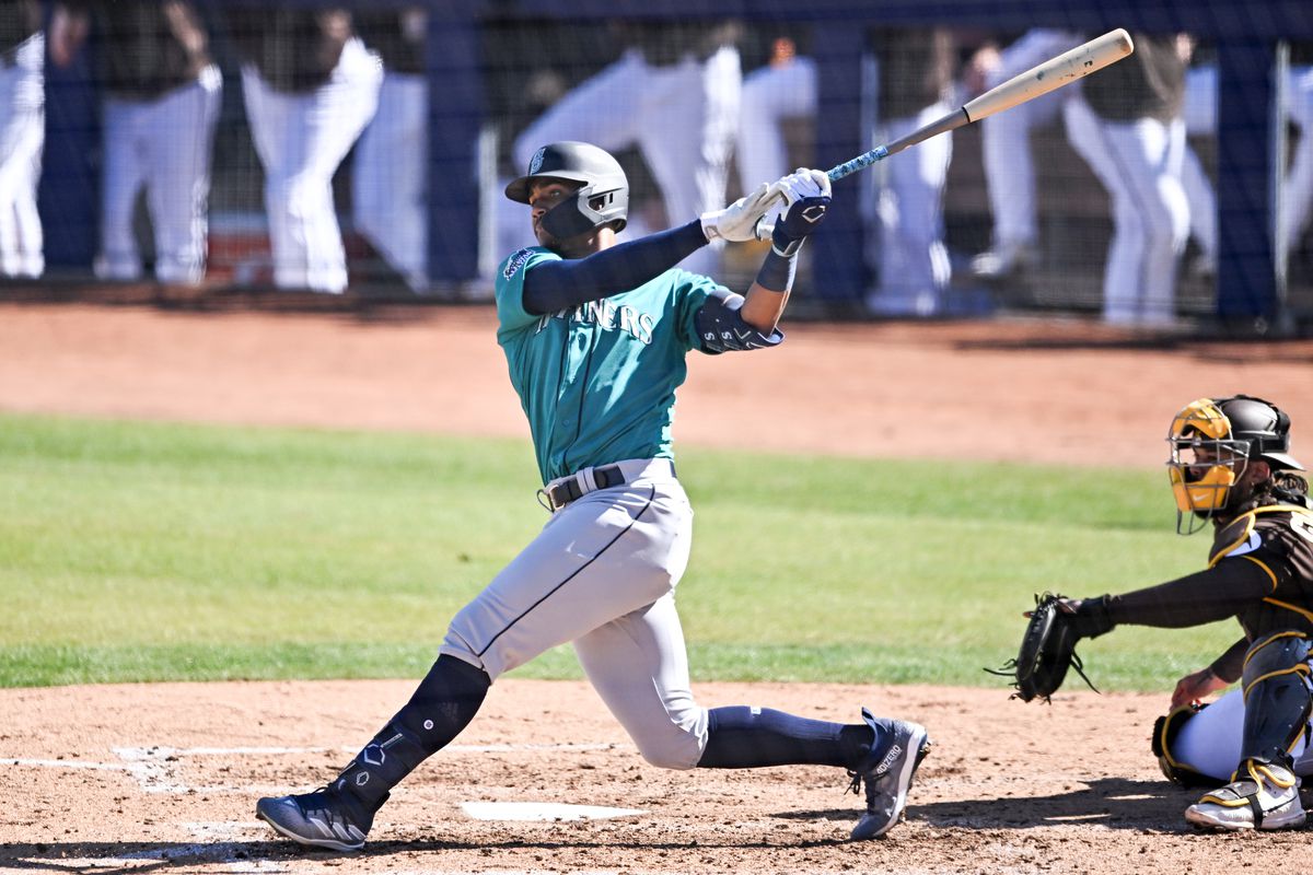 Julio Rodríguez #44 of the Seattle Mariners bats during the fifth inning of a spring training game against the San Diego Padres at Peoria Stadium on February 24, 2023 in Peoria, Arizona.
