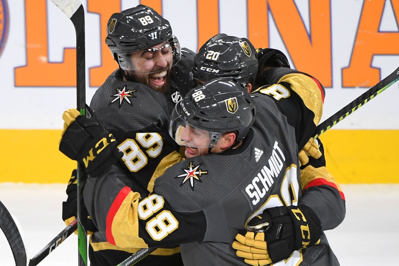 Jan 4, 2020; Las Vegas, Nevada, USA; Vegas Golden Knights players celebrate after Vegas Golden Knights center Chandler Stephenson (20) scored in overtime to give the Golden Knights a 5-4 victory over the St. Louis Blues at T-Mobile Arena.