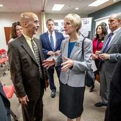 David Staszak, divisional fundraising vice president for the American Red Cross, and Sister Jean B. Bingham, general president of The Church of Jesus Christ of Latter-day Saints' Relief Society, talk prior to a press conference in Murray on Friday, Oct. 26, 2018, where the church donated $1.5 million to the American Red Cross for 10 new emergency response vehicles.