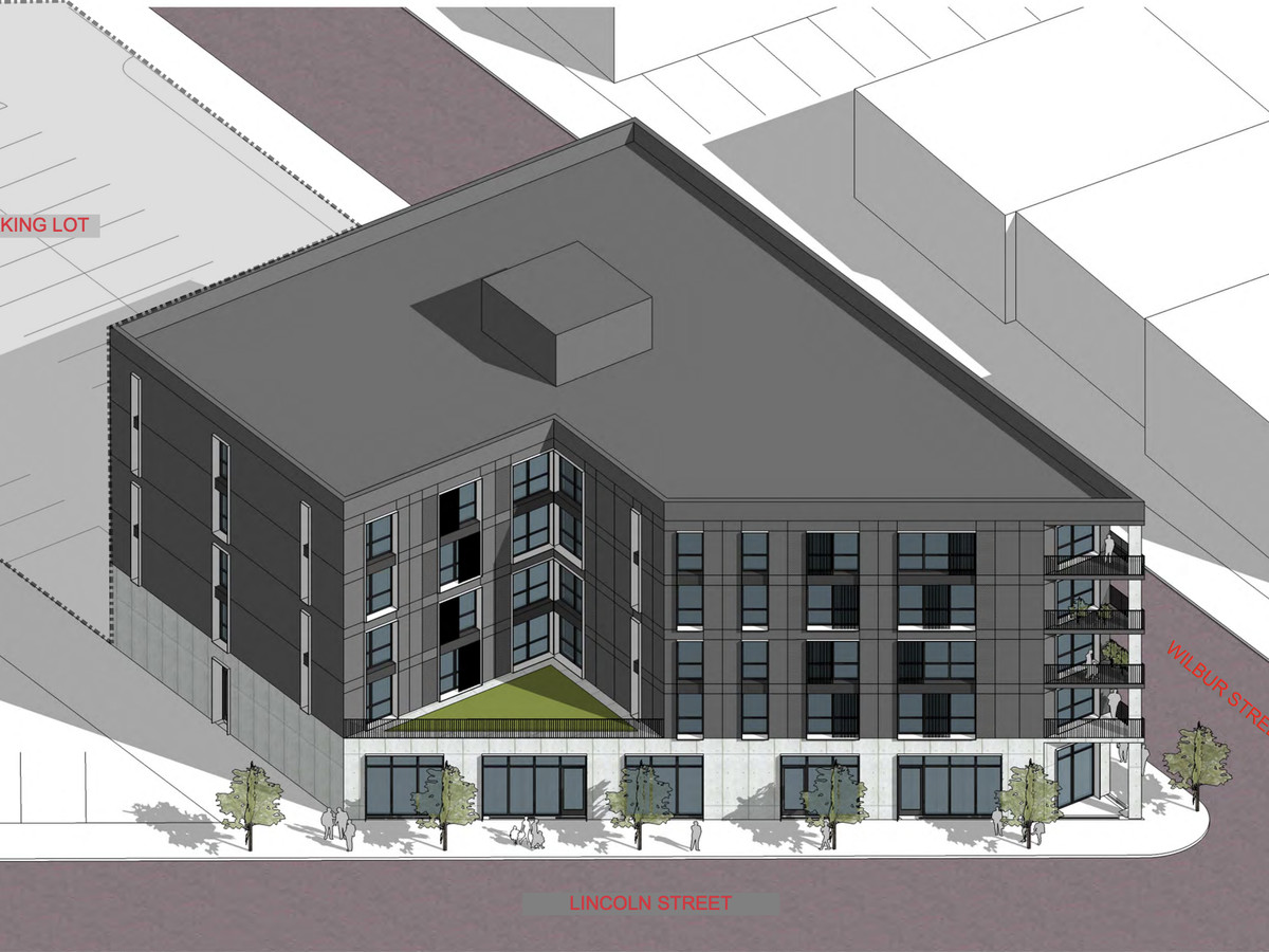 Rendering of a triangular-shaped four-story building which is part of NW Goldberg Developments in Detroit.