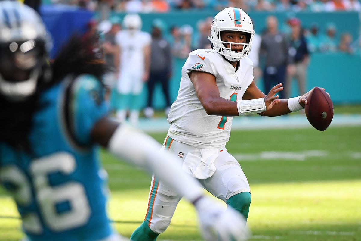 Tua Tagovailoa #1 of the Miami Dolphins looks to throw the ball during the second half against the Carolina Panthers at Hard Rock Stadium on November 28, 2021 in Miami Gardens, Florida