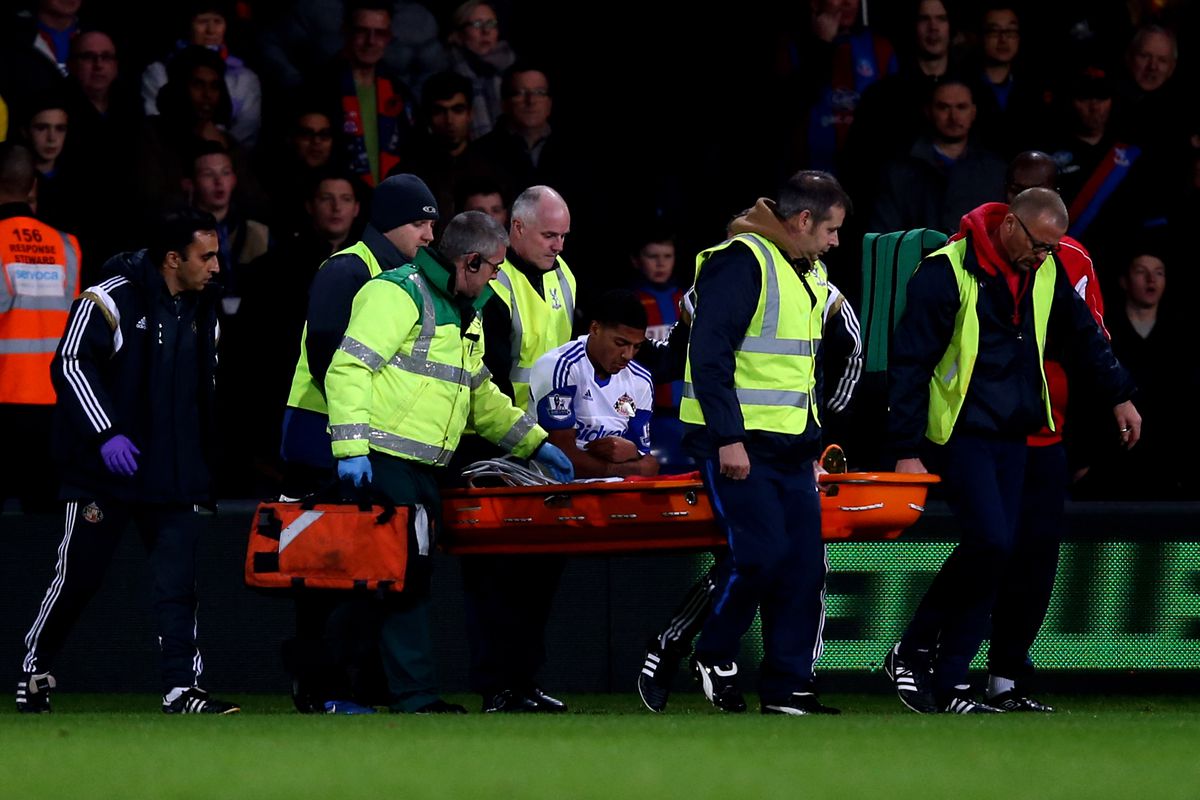 van Aanholt being stretchered off at Crystal Palace