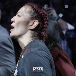 Cris Cyborg sings on her way to Octagon at UFC 219.