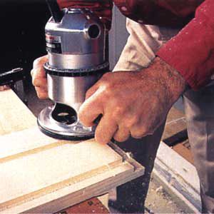 <p>2.USE THE ROUTER AGAIN to cut 3/8-in.-deep X 3/4-in.-wide rabbets across the ends of the front and back to accept the shelf sides.</p>