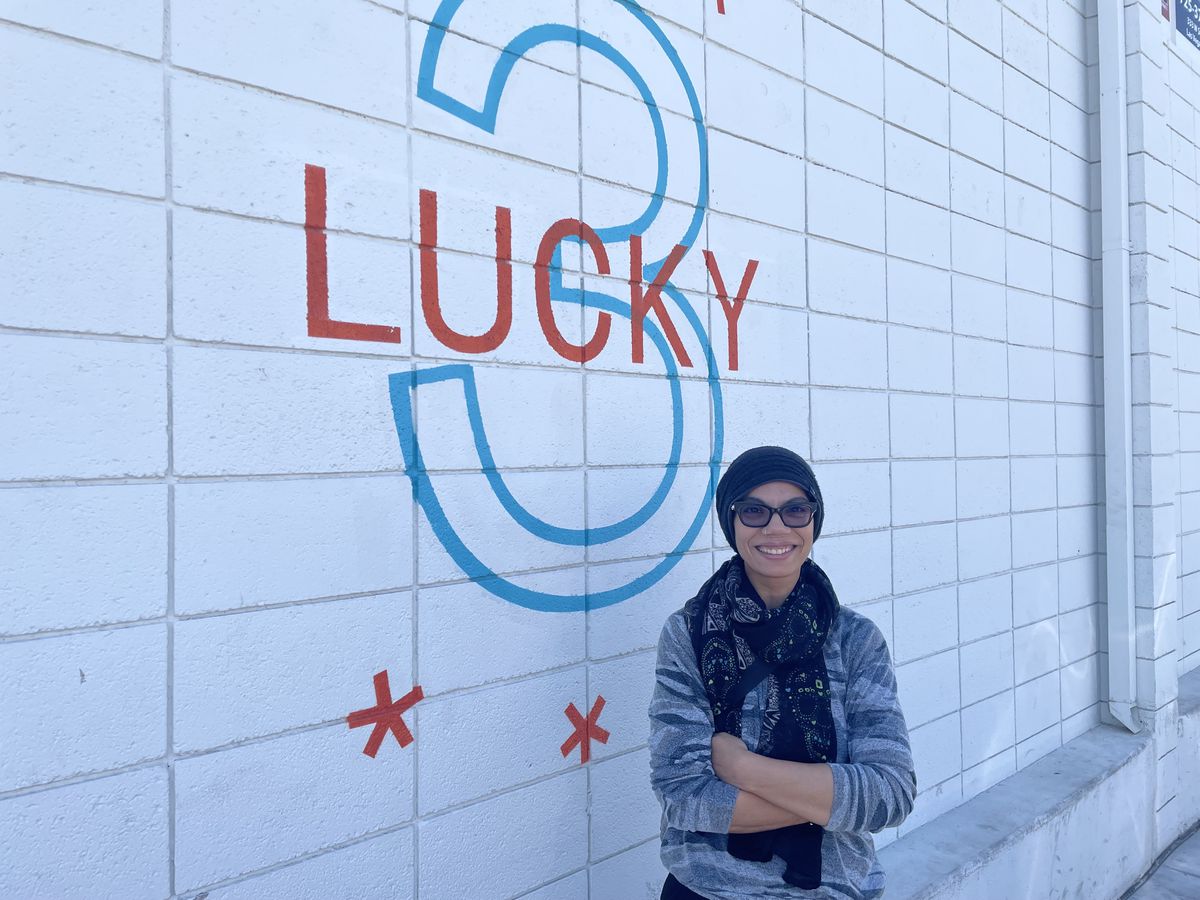 Iman Haggag stands outside at Lucky 3 cloud kitchen