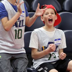 Grant Ure cheers during a game of NBA Math Hoops at the Vivint Smart Home Arena in Salt Lake City on Monday, Jan. 29, 2018.