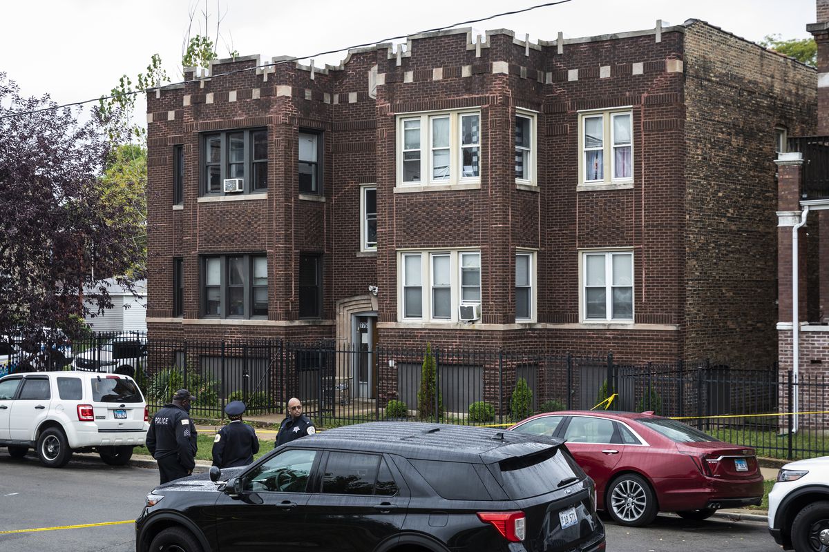 Chicago Police investigate inside an apartment in the 7700 block of South Carpenter Street after an officer shot and killed a man while answering a call of a domestic disturbance in the Gresham building on the South Side, Monday morning, Oct. 4, 2021.