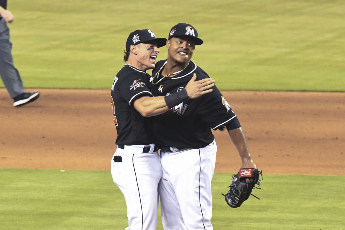 Edinson Volquez #36 of the Miami Marlins celebrates with Derek Dietrich #32 after throwing a no hitter against the Arizona Diamondbacks at Marlins Park on June 3, 2017
