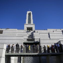 People enter the Conference Center for the morning session of the LDS Church’s 187th Annual General Conference in Salt Lake City on Saturday, April 1, 2017.