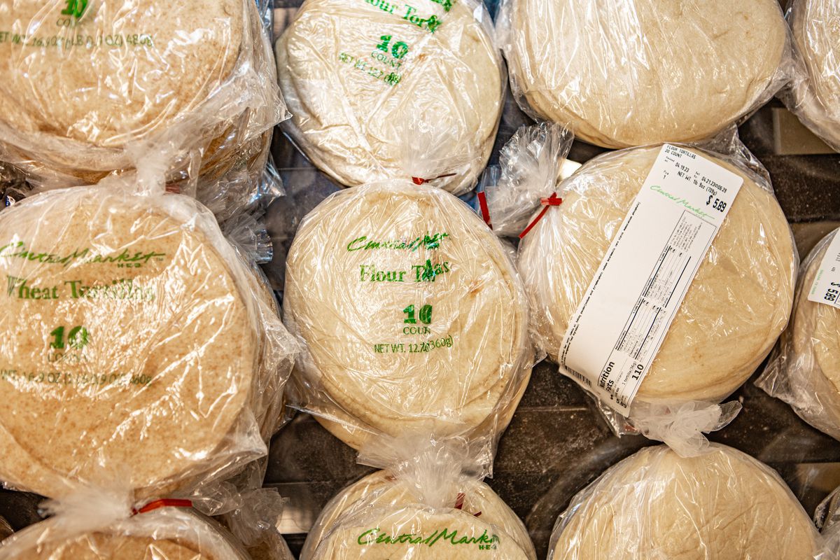 Piles of plastic-wrapped tortillas.