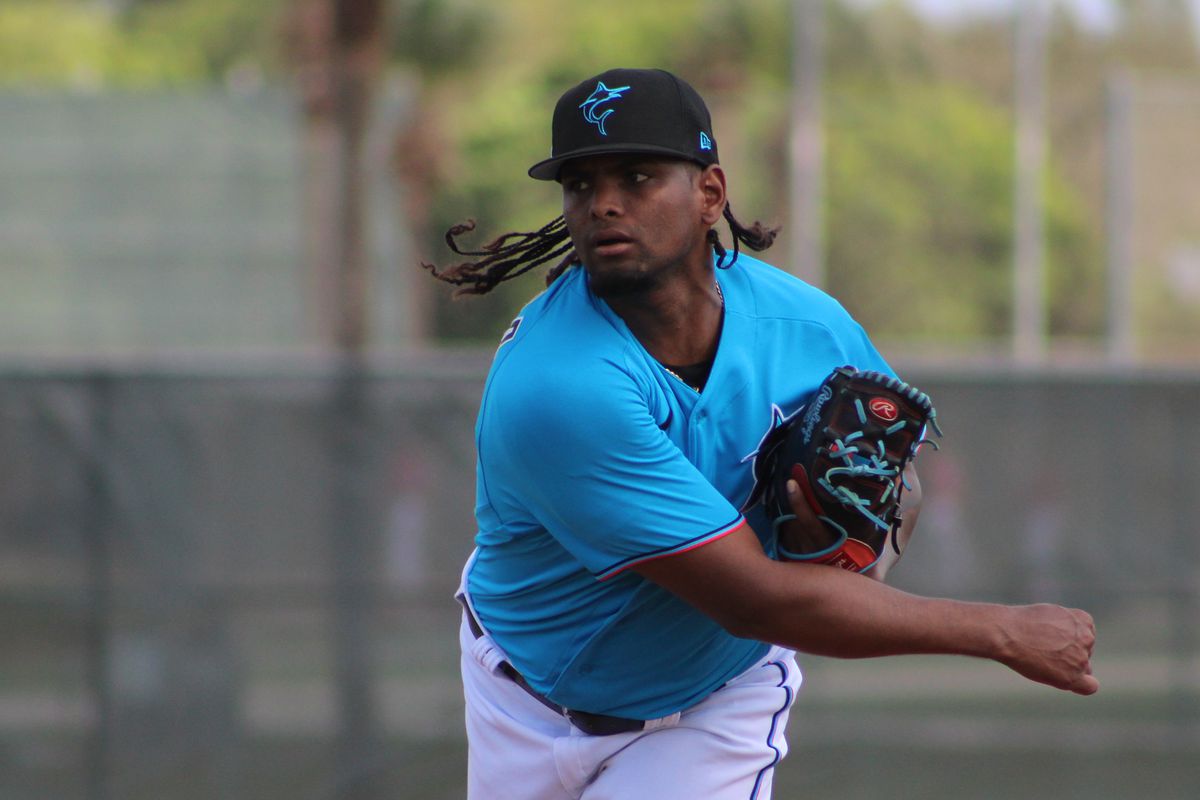 Marlins pitcher Edward Cabrera delivers a pitch on the Roger Dean Chevrolet Stadium backfields during 2023 Spring Training