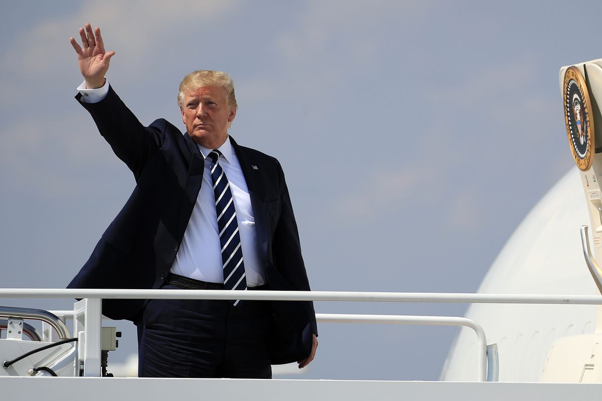 FILE - President Donald Trump waves as he boards Air Force One at Andrews Air Force Base, Md., Friday, July 19, 2019.