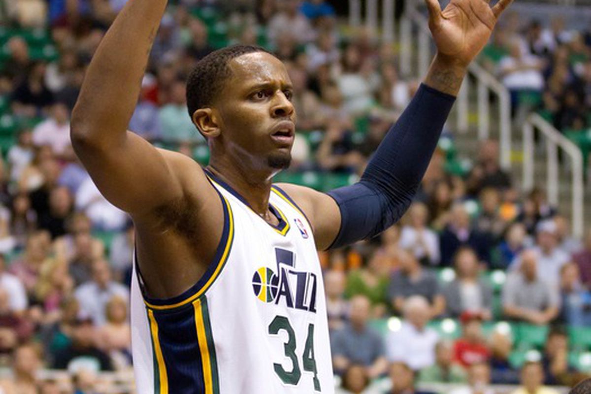 April 4, 2012; Salt Lake City, UT, USA; Utah Jazz small forward C.J. Miles (34) reacts to having a foul called against him during the first quarter against the Phoenix Suns at Energy Solutions Arena. Mandatory Credit: Russ Isabella-US PRESSWIRE