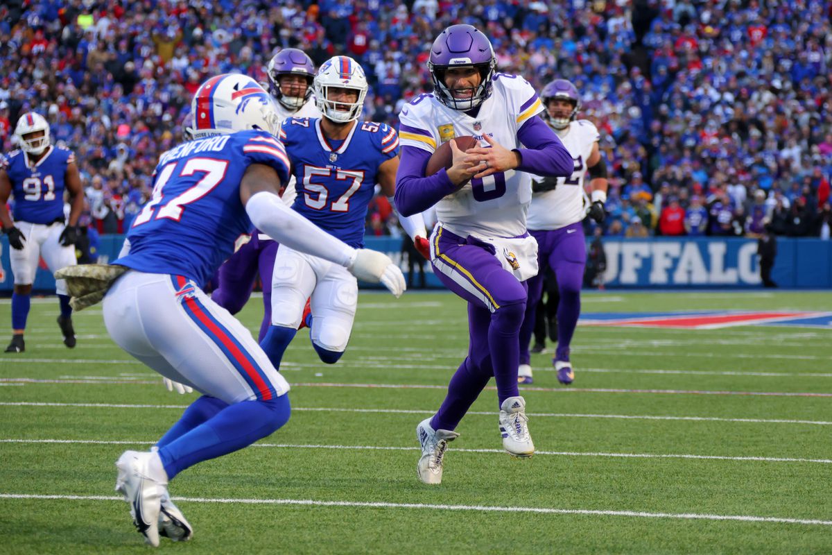 Kirk Cousins #8 of the Minnesota Vikings runs the ball during the fourth quarter against the Buffalo Bills at Highmark Stadium on November 13, 2022 in Orchard Park, New York.