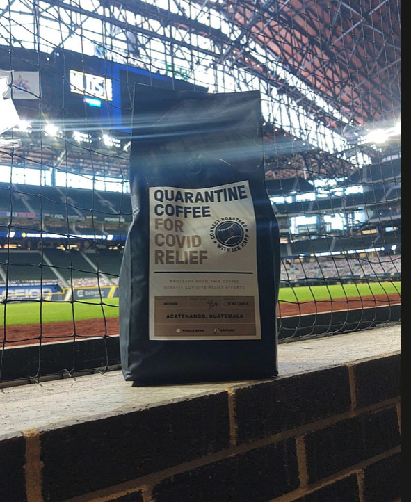 A bag of coffee at a baseball stadium.