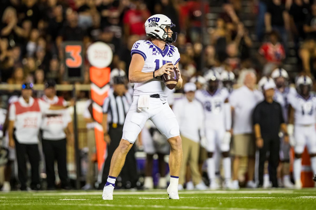 Quarterback Max Duggan of the TCU Horned Frogs looks to pass during the second half of the college football game against the Texas Tech Red Raiders at Jones AT&amp;T Stadium on October 09, 2021 in Lubbock, Texas.