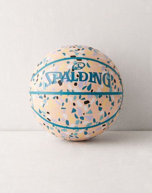 A Spalding basketball covered in a terrazzo pattern.