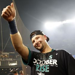Cal Raleigh #29 of the Seattle Mariners celebrates after walk-off home run during the ninth inning against the Oakland Athletics at T-Mobile Park