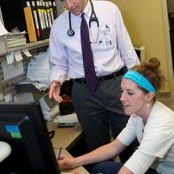 Dr. Nathan Wanner addresses Melissa Gurr, RN, at University of Utah Hospital.