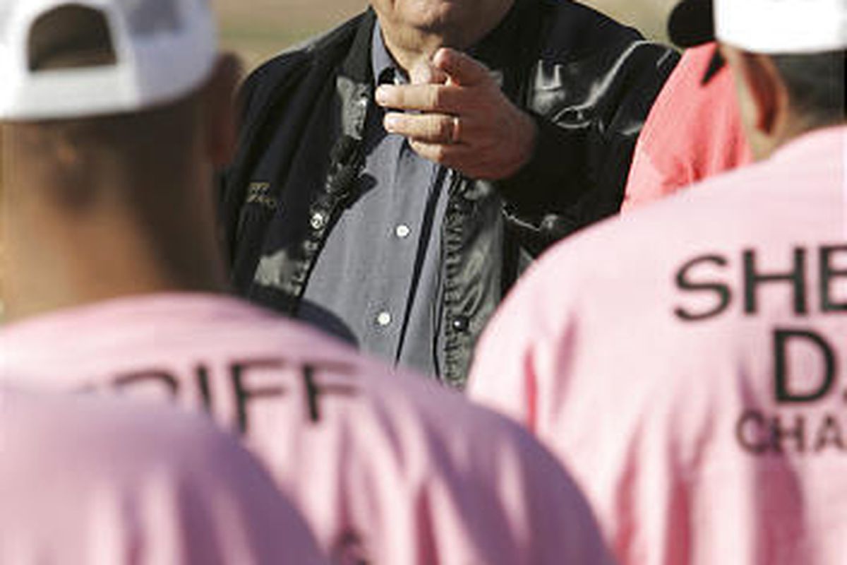 Maricopa Sheriff Joe Arpaio addresses chain-gang members in Phoenix in 2007.