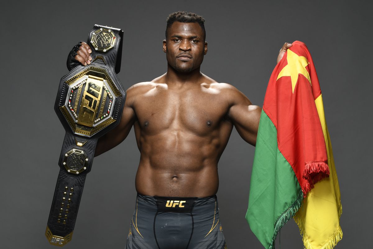 Heavyweight champion Francis Ngannou poses for a photo after his UFC 270 win over Ciryl Gane.