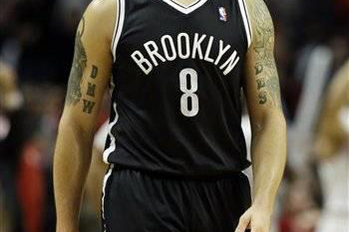 Brooklyn Nets guard Deron Williams reacts as he walks off the court after their 83-82 loss to the Chicago Bulls in an NBA basketball game in Chicago on Saturday, Dec. 15, 2012. (AP Photo/Nam Y. Huh)