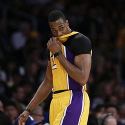 Los Angeles Lakers' Dwight Howard walks off the court during the second of an NBA basketball game against the Houston Rockets in Los Angeles, Wednesday, April 17, 2013. The Lakers won 99-95 in overtime. (AP Photo/Jae C. Hong)