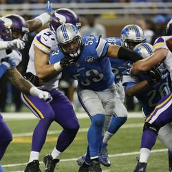 Detroit Lions outside linebacker Kyle Van Noy (53) is blocked by Minnesota Vikings middle linebacker Audie Cole (57) during the second half of an NFL football game, Sunday, Oct. 25, 2015, in Detroit. (AP Photo/Duane Burleson)