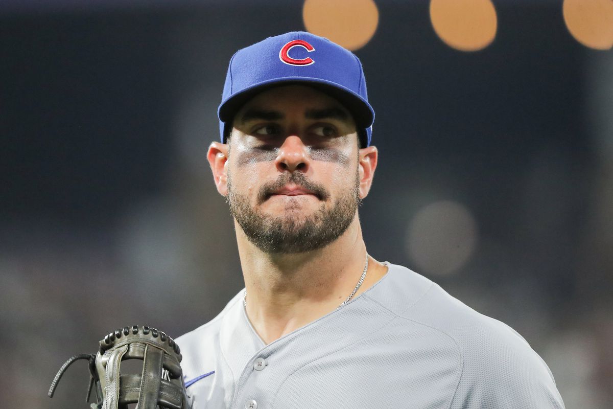 Chicago Cubs center fielder Mike Tauchman looks on during a Major League Baseball game between the Chicago Cubs and the Chicago White Sox on July 26, 2023 at Guaranteed Rate Field in Chicago, IL.