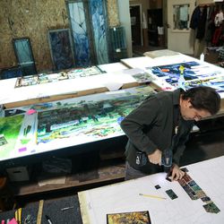 Tom Holdman works on “The Roots of Knowledge,” a 200-foot-long stained glass installation for Utah Valley University, at Holdman Studios in Lehi on Friday, Nov. 4, 2016. The university announced a $1.5 million donation from philanthropists Marc and Deborah Bingham that will enable the completion of the massive stained glass installation.