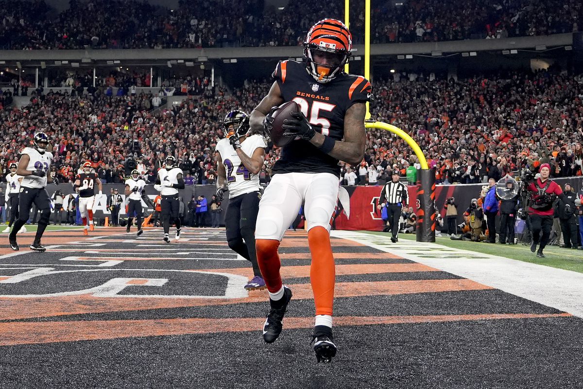 Tee Higgins #85 of the Cincinnati Bengals catches a pass in the end zone to score a two point conversion against the Baltimore Ravens during the third quarter in the AFC Wild Card playoff game at Paycor Stadium on January 15, 2023 in Cincinnati, Ohio.