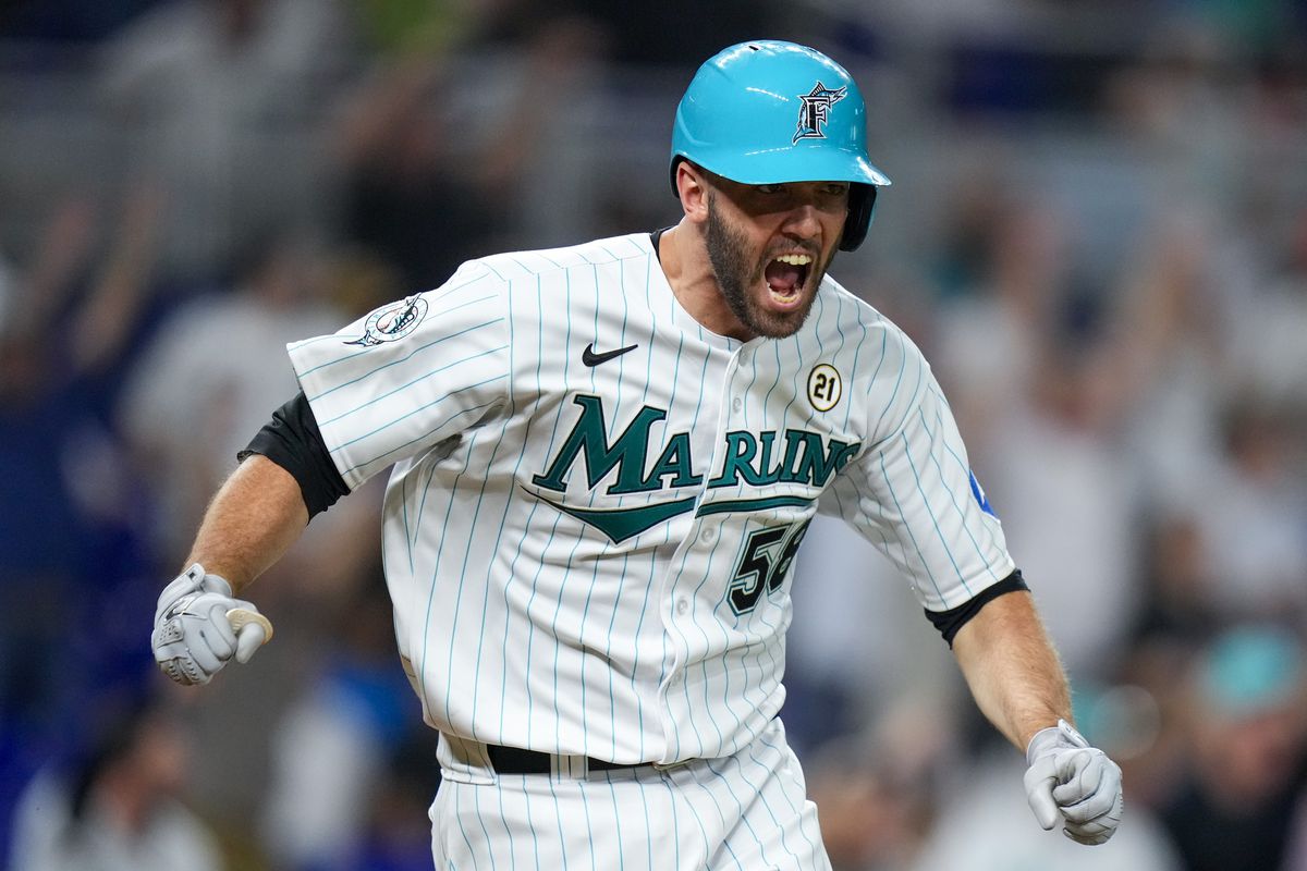 Jacob Stallings of the Miami Marlins reacts after hitting a double to clear the bases against the Atlanta Braves during the eighth inning at loanDepot park on September 15, 2023 in Miami, Florida.