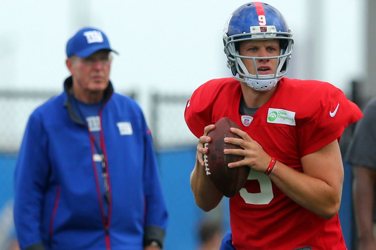 Ryan Nassib with tom Coughlin watching closely