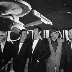 William Shatner, who play Capt. James Kirk (left) and Leonard Nimoy, who plays Mr. Spock, the first officer on the U.S.S. Enterprise, the Star Trek spaceship in back have a laugh during a press conference at paramount Studios where the new movie version of the old TV series was announced on Tuesday, March 29, 1978 in Los Angeles. 