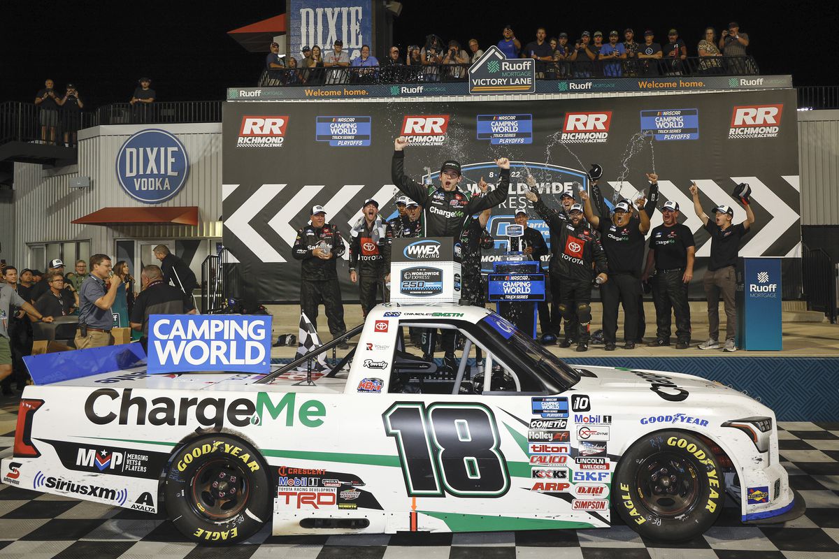 Chandler Smith, driver of the #18 Charge Me Toyota, celebrates in victory lane after winning the NASCAR Camping World Truck Series Worldwide Express 250 for Carrier Appreciation at Richmond Raceway on August 13, 2022 in Richmond, Virginia.