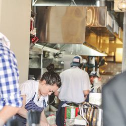 On the line [Photo: Eater Philly/<a href="http://www.alyssamaloof.com">Alyssa Maloof</a>]