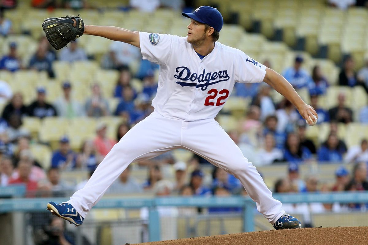 LOS ANGELES, CA: Clayton Kershaw #22 of the Los Angeles Dodgers throws a pitch against the Milwaukee Brewers at Dodger Stadium in Los Angeles, California.  (Photo by Stephen Dunn/Getty Images)